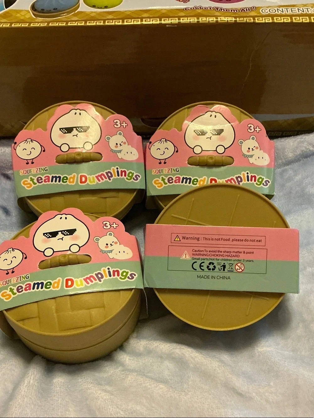 Squeezing (1) Large Glitter Steamed Fidget Dumplings Toy.